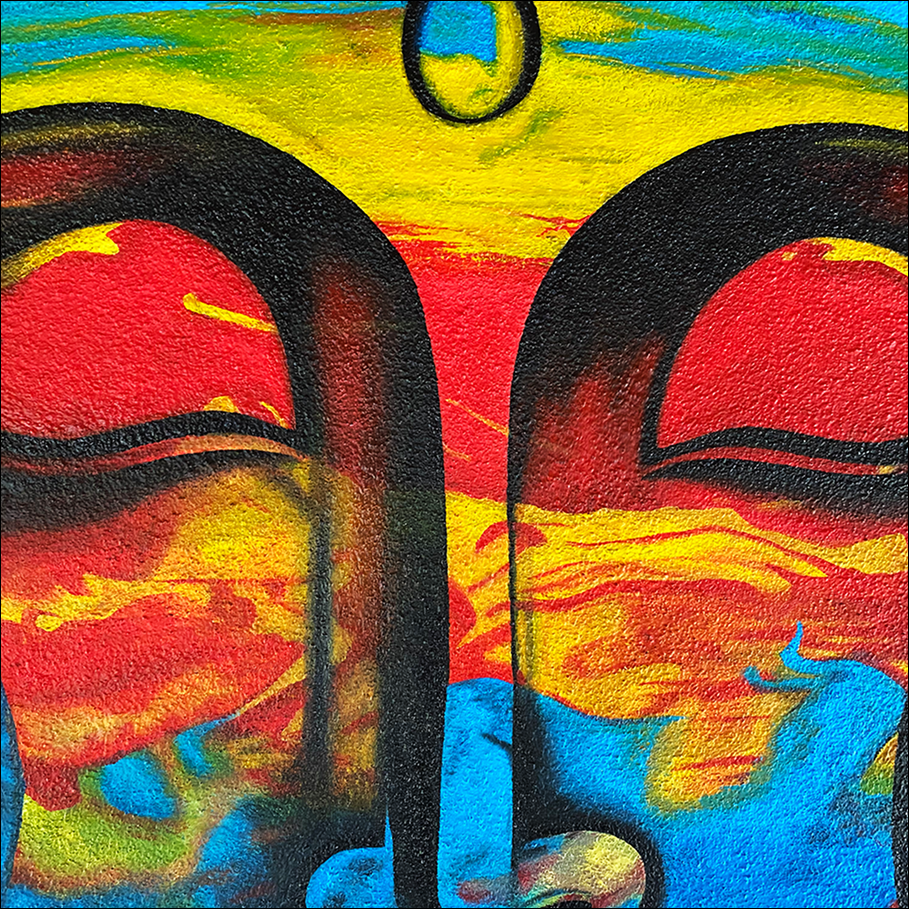 Vivid painting of two serene faces in red, yellow and blue